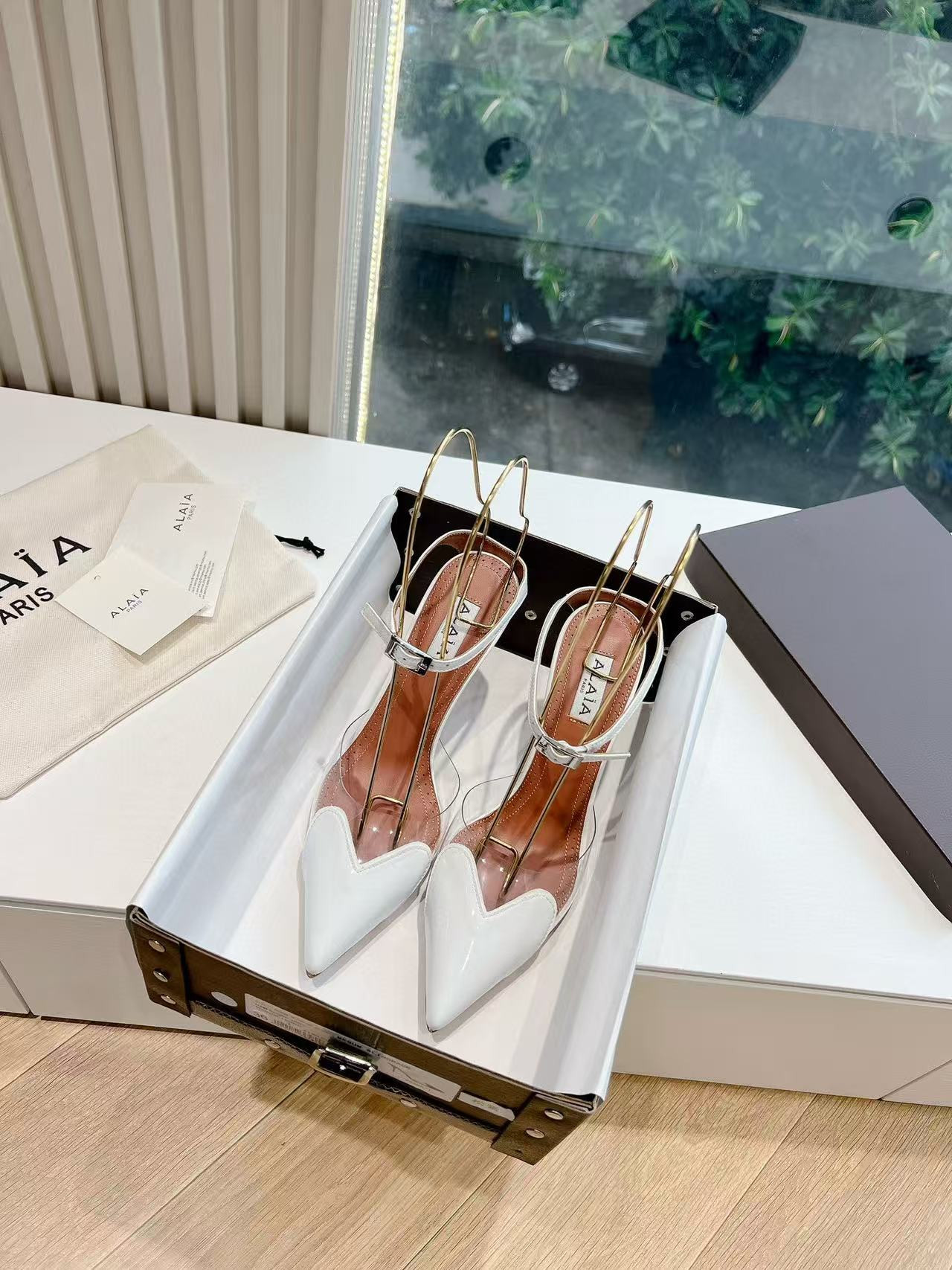 UA ALAÏA Patent Heart-Toe Stiletto Pumps