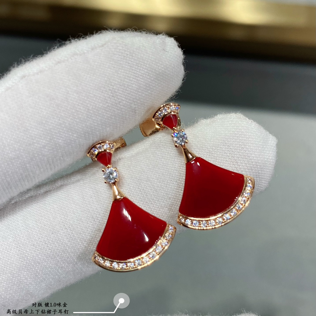 b*l*ai scalloped skirt with Di*m*nds earrings