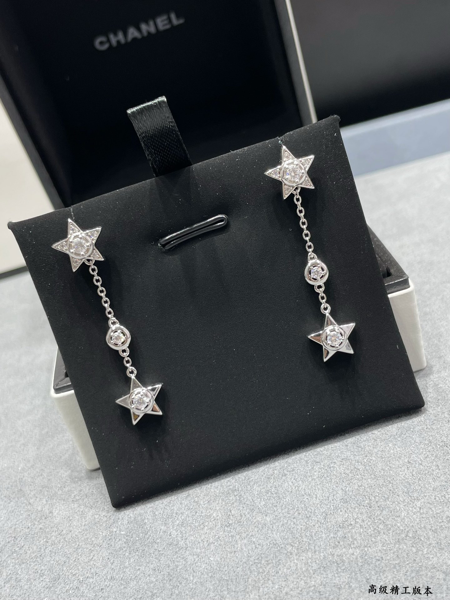 Ch*el hanging chain star earrings