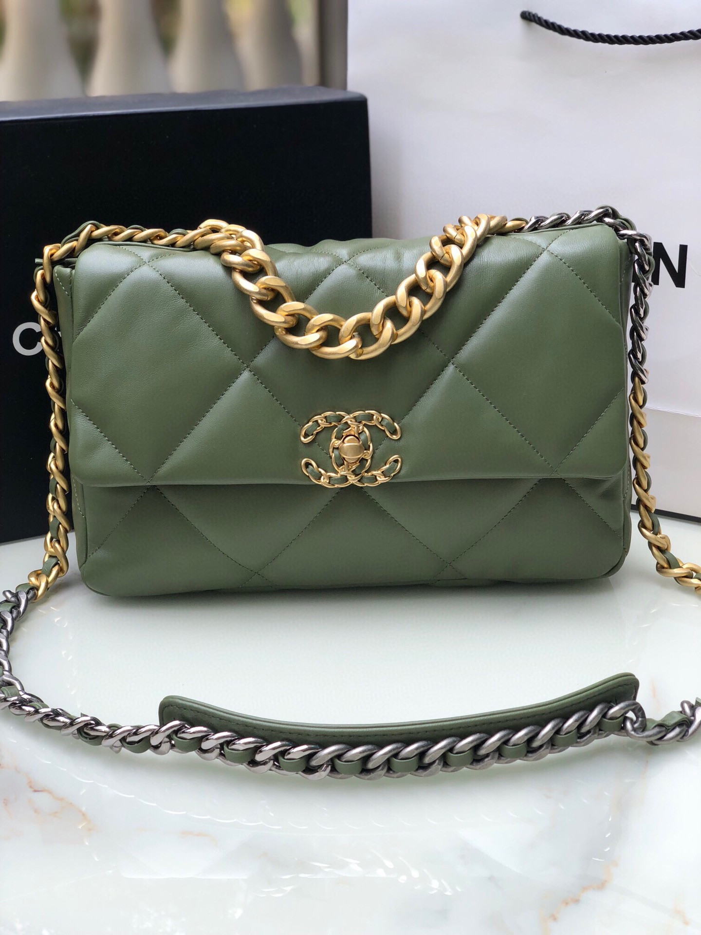 Ch*el 19 large handbag shiny leather, gold-tone, silver-tone & ruthenium-finish metal dark green 7.8 × 11.7 × 3.9 in
