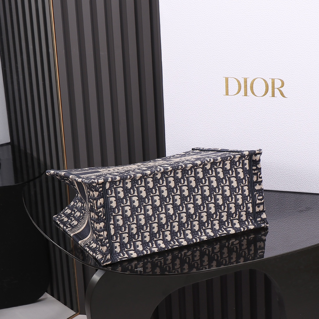 medium D*or book tote  ecru and blue D*or oblique embroidery 14 x 11 x 6.5 inches