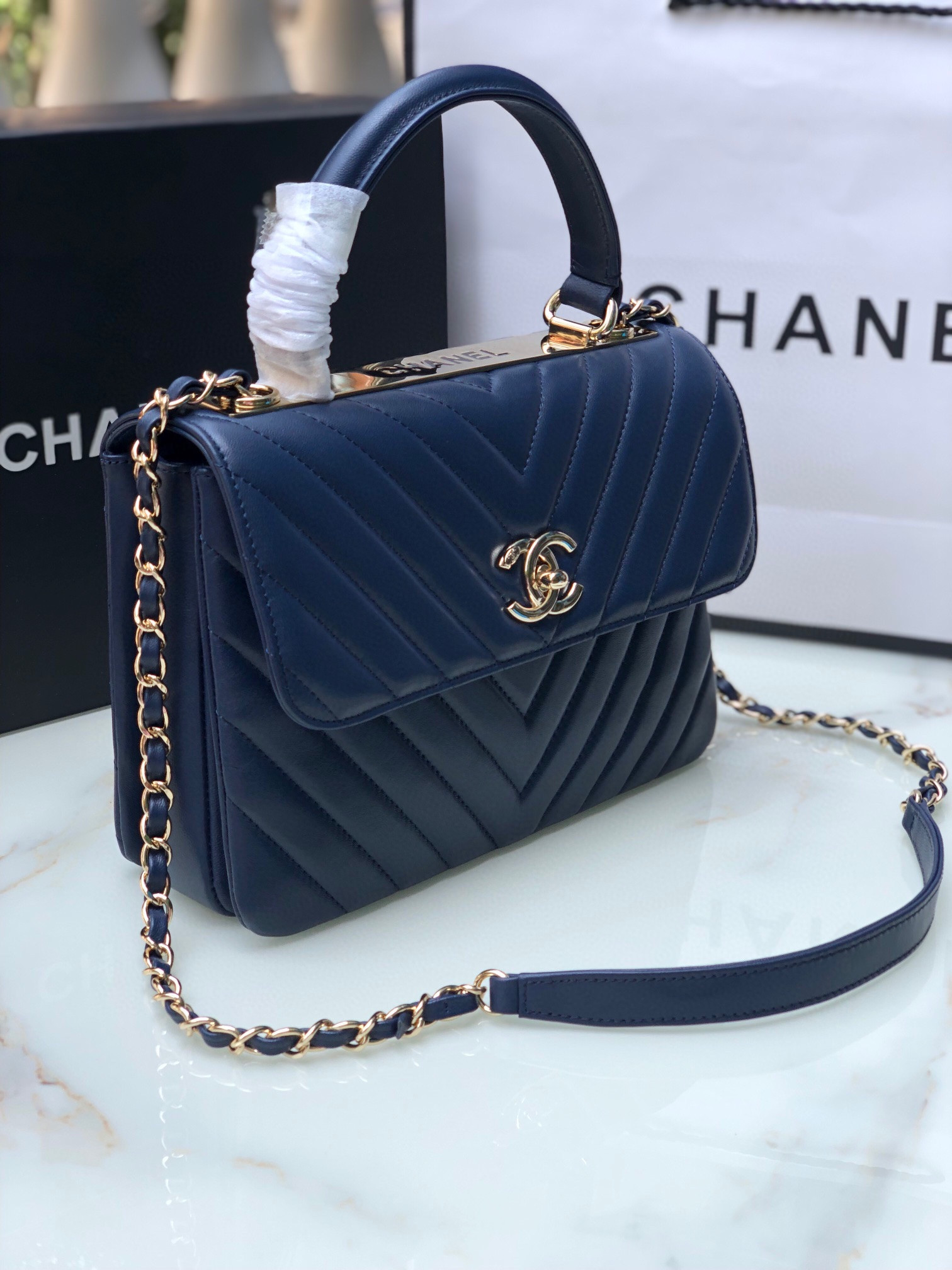 Ch*el flap bag with top handle navy 6.6 × 9.8 × 4.7 in