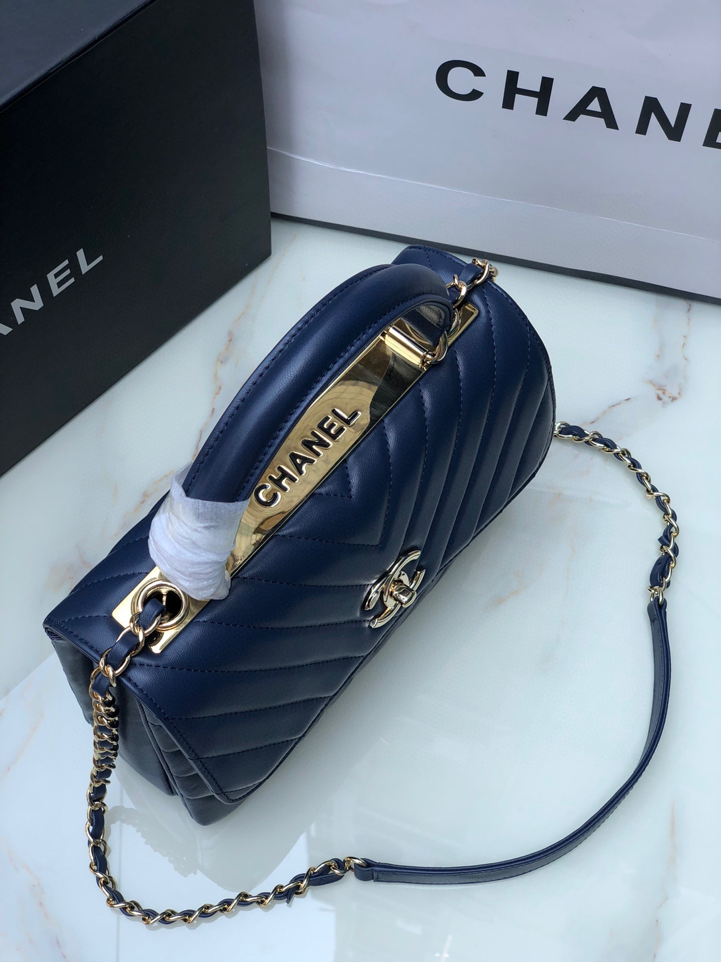 Ch*el flap bag with top handle navy 6.6 × 9.8 × 4.7 in