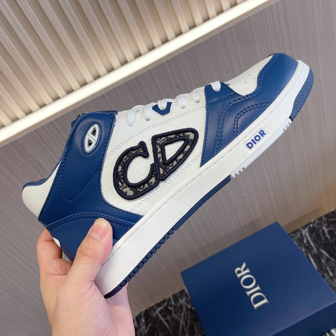 ua D*or b57 mid-top sneaker navy blue and white