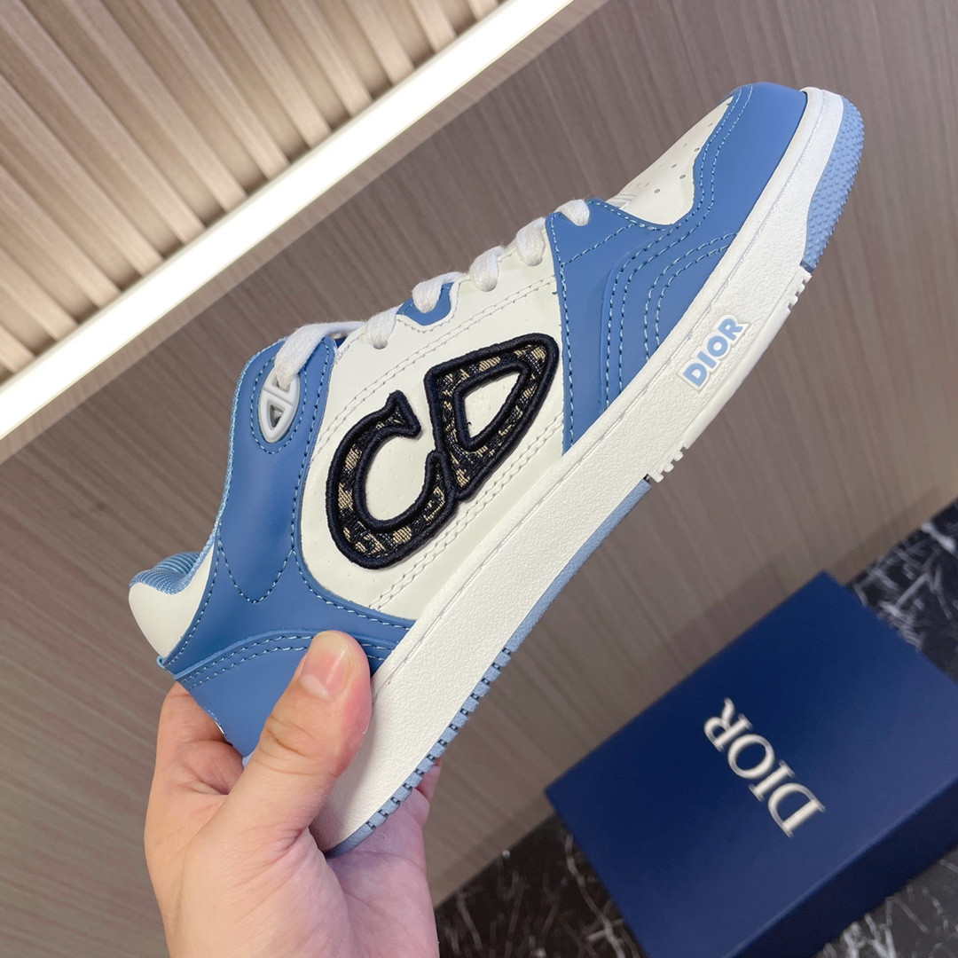 ua D*or b57 low-top sneaker light blue and white